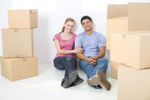 Professional movers handling furniture in a Bexleyheath property