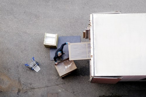 Careful wrapping and boxing of household items for relocation