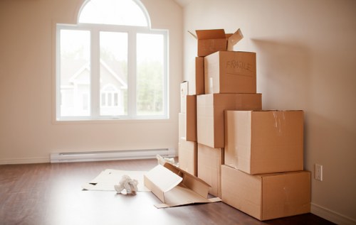 Office furniture and boxes prepared for a commercial move in Bexleyheath