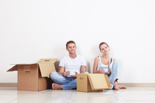 A removals team navigating a flat move with limited access