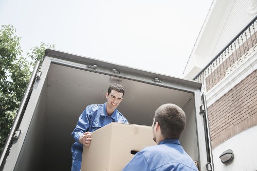 Packed boxes and furniture ready for transport by a local removals company